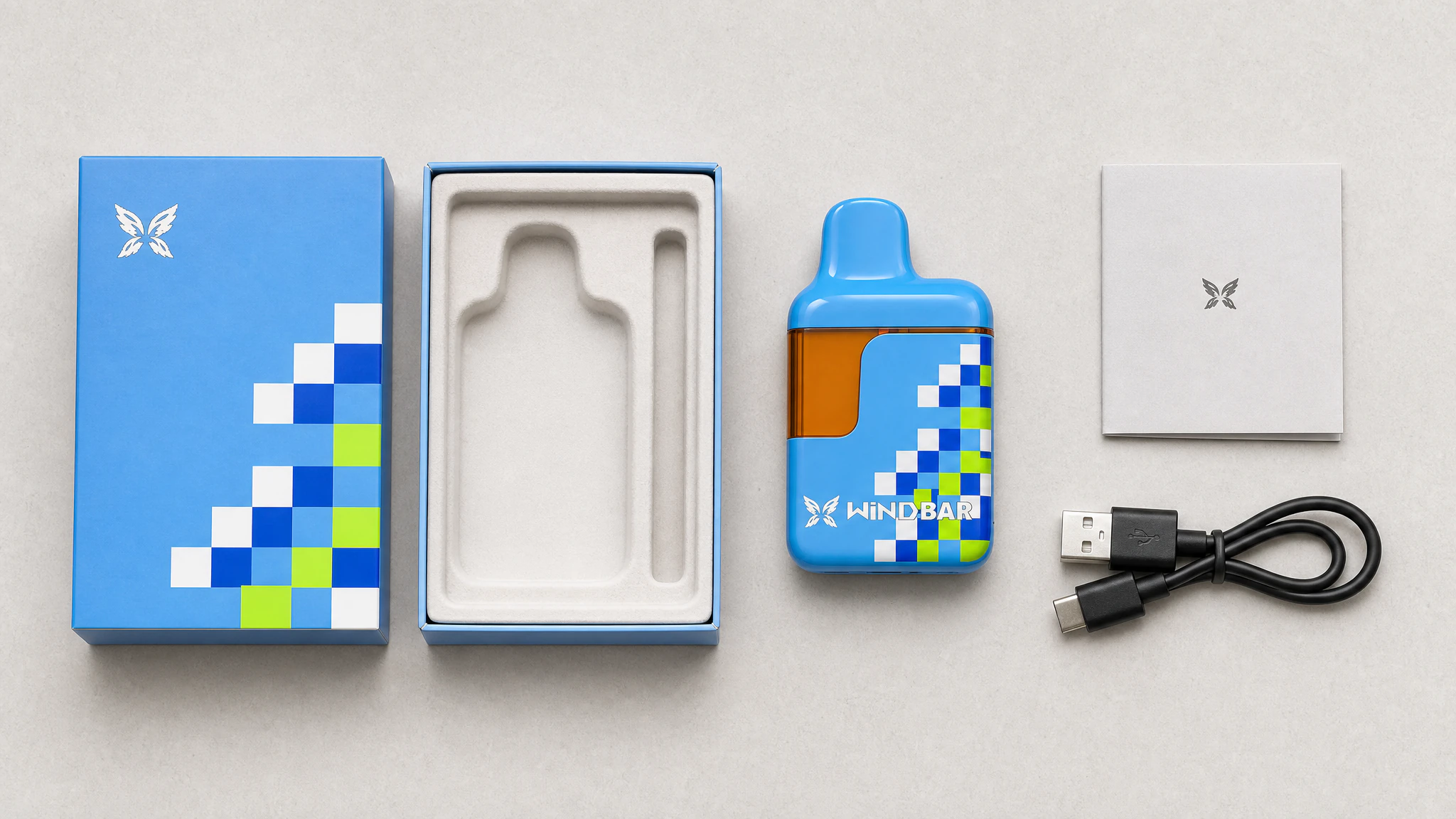 Concept pack layout with one D95, compact carton, fitted tray, manual and USB-A-to-USB-C cable
